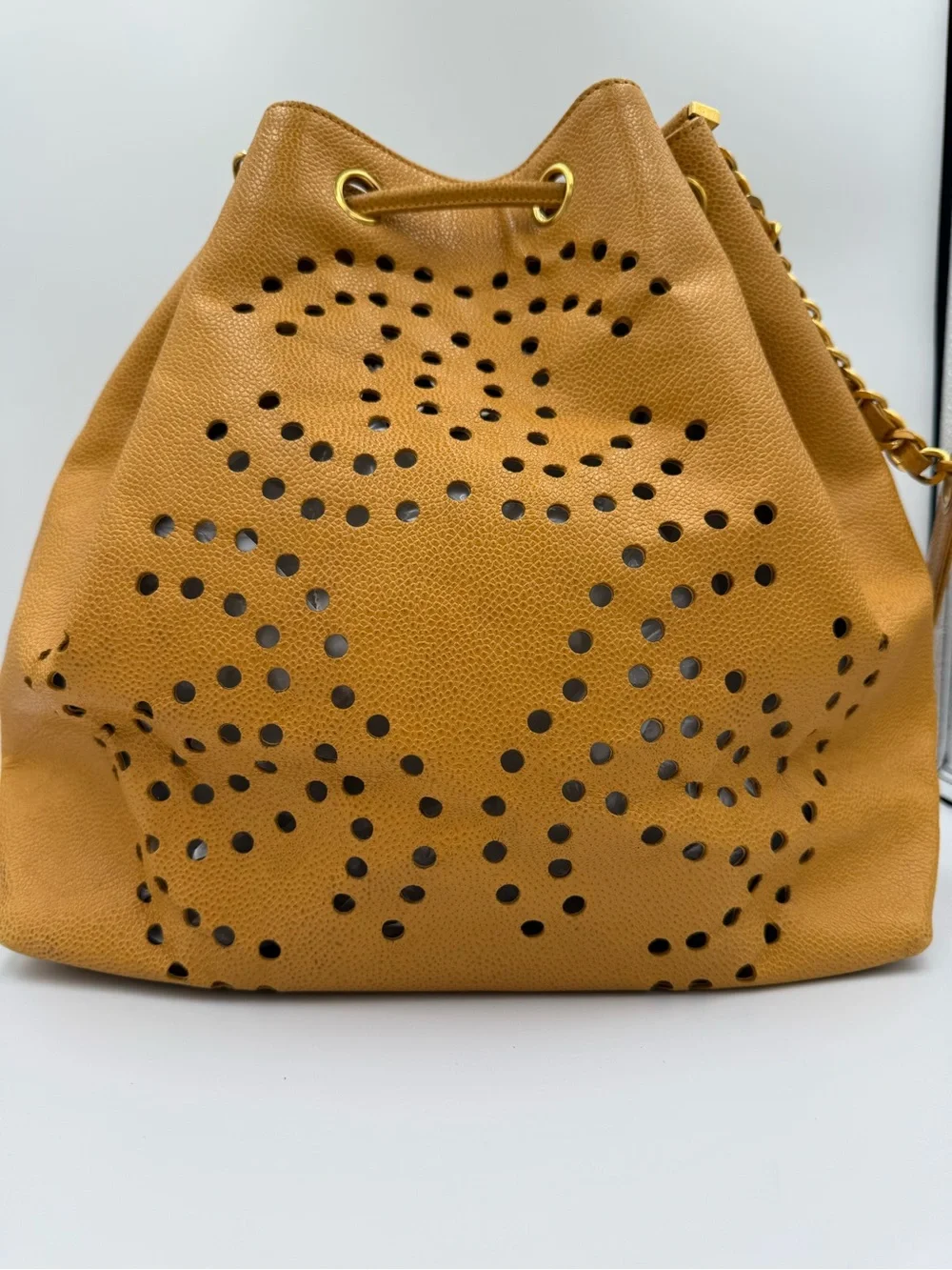 Chanel Perforated Drawstring Bucket Bag in Caviar Leather